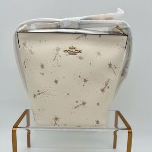 Coach Logan Duffle Bag With Star Print Chalk Cream